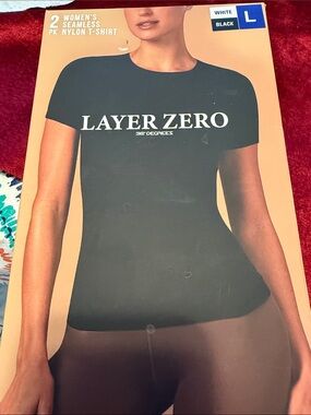 Women's Seamless 1-Black 1- white  Nylon T-Shirt size large comfortable not worn